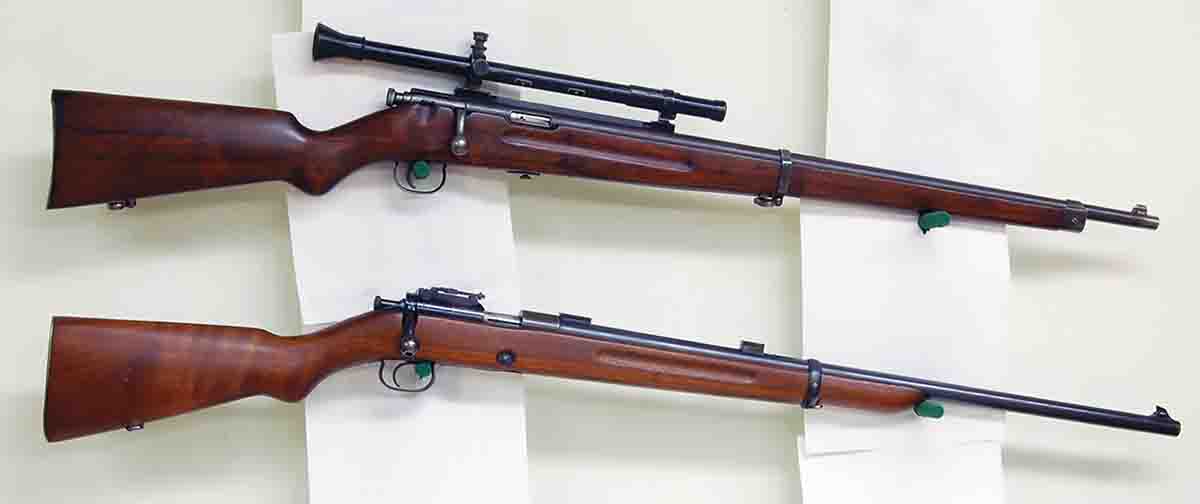 A Savage Model 1919 with a Mossberg scope from the 1930s (top) and a Winchester Model 52 first variation slow lock made in 1923 (bottom).